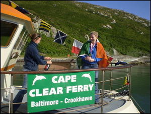 World champion Aoife Sheehan returns in triumph to Cape Clear Island aboard the Cailn ir